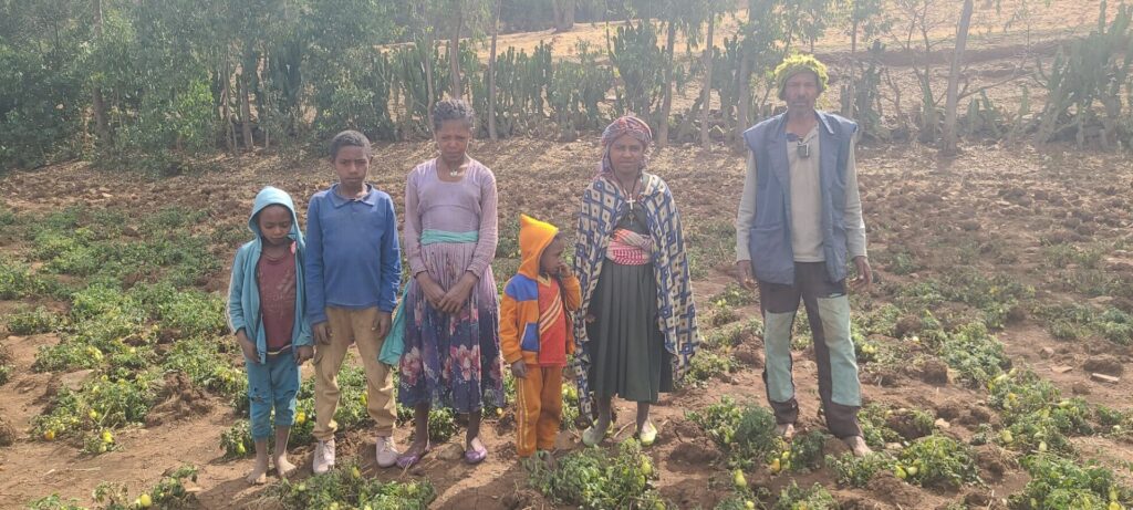 Ato and his family on the farm they created