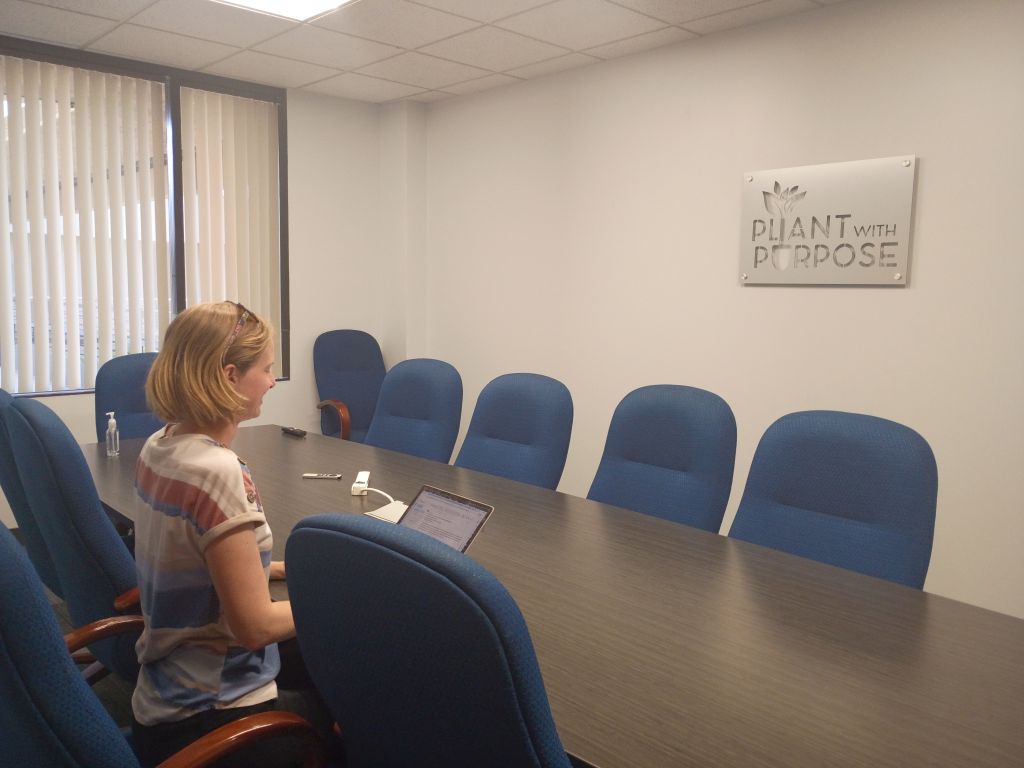 Plant With Purpose conference room and staff